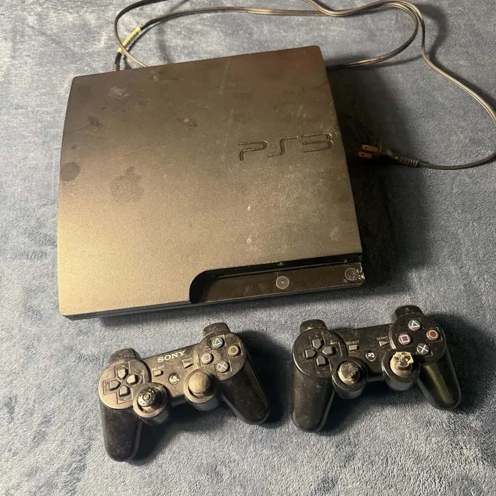 Sony PlayStation 3 Slim CECH-3001A Charcoal Black Console with Two Controllers